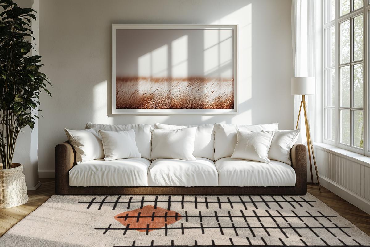 Bright living room with modern design rug in beige featuring a graphic line pattern and terracotta a